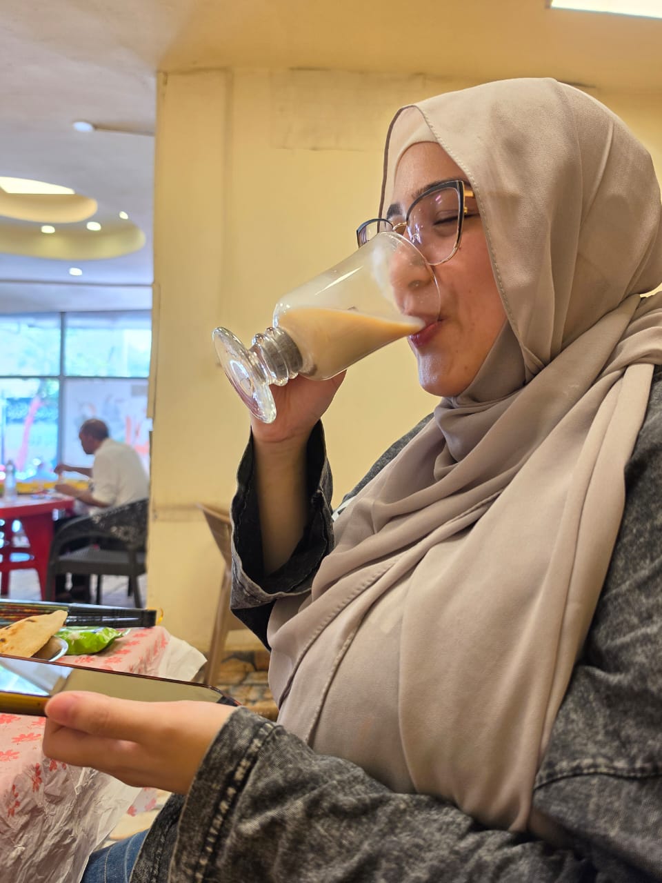 Touqa enjoying breakfast on a day out together